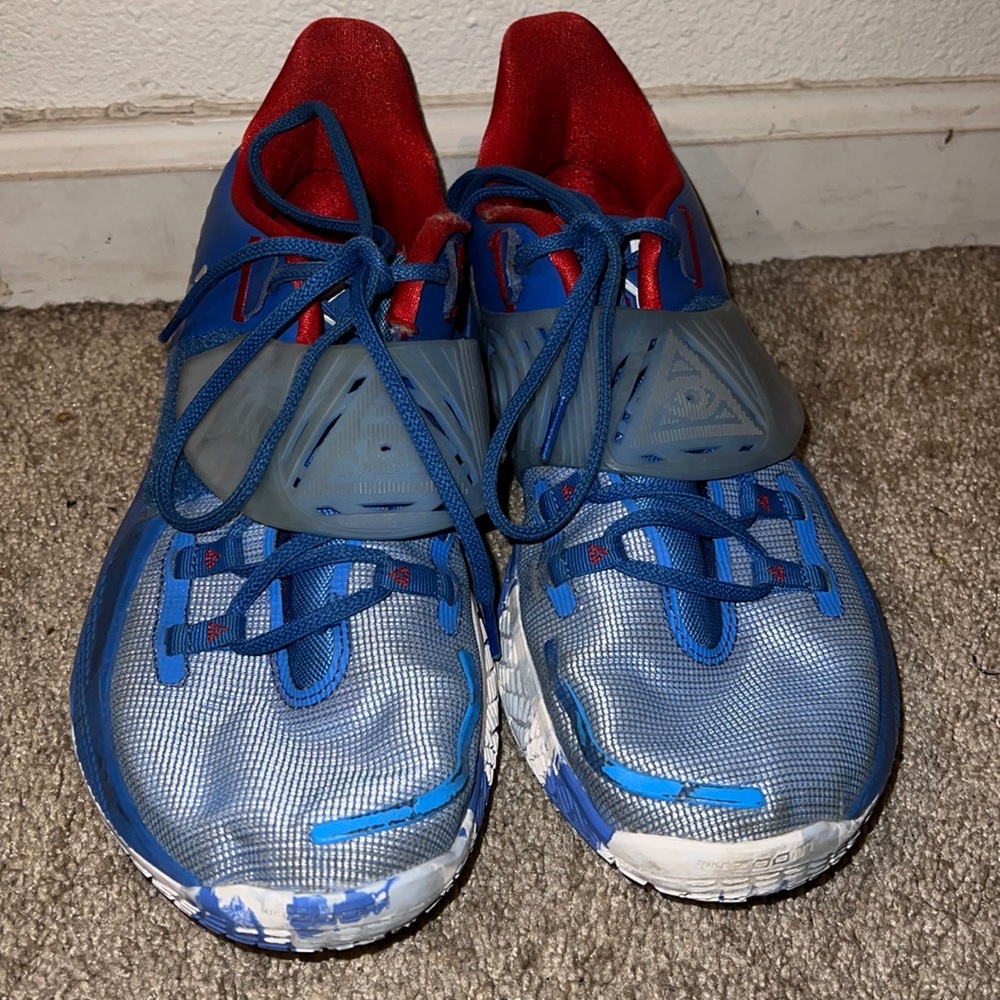 Red, white and blue Kyrie basketball shoes